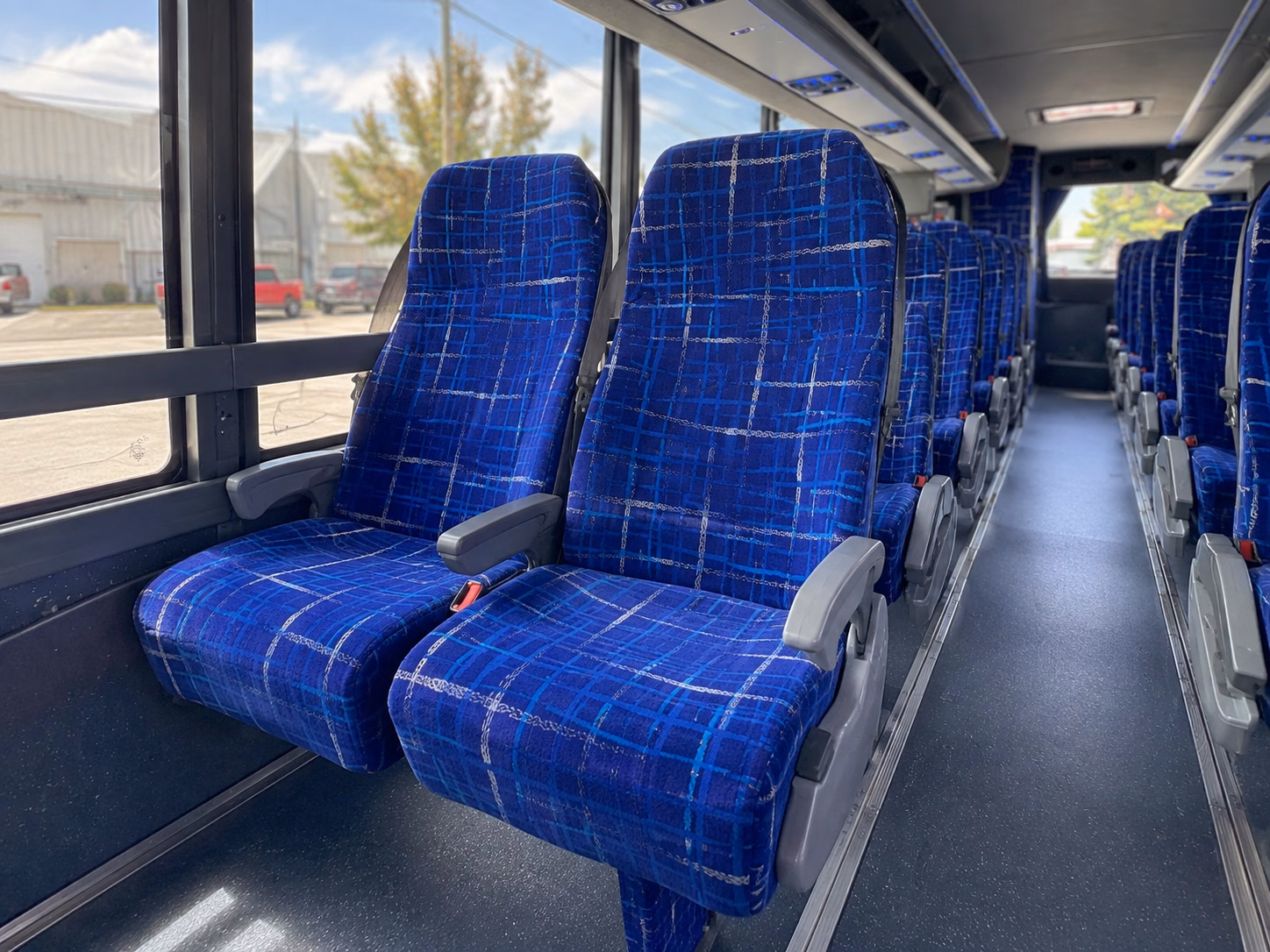 how seasonality and peak times affect charter bus rental prices in plymouth michigan
